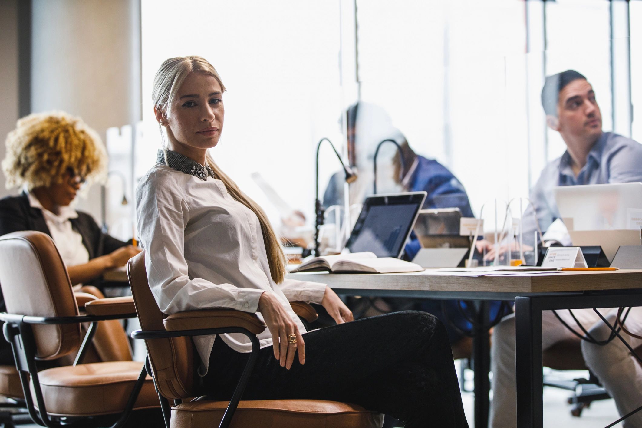 Bookkeeping professional working at a desk in a modern office